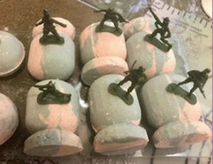Bombs away bath bomb with toy army man inside